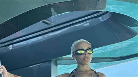 doja cat swim suit|Doja Cat Vacations in a Black Bikini Embellished With Dangling .